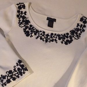 Designer: Black embroidery on Ivory